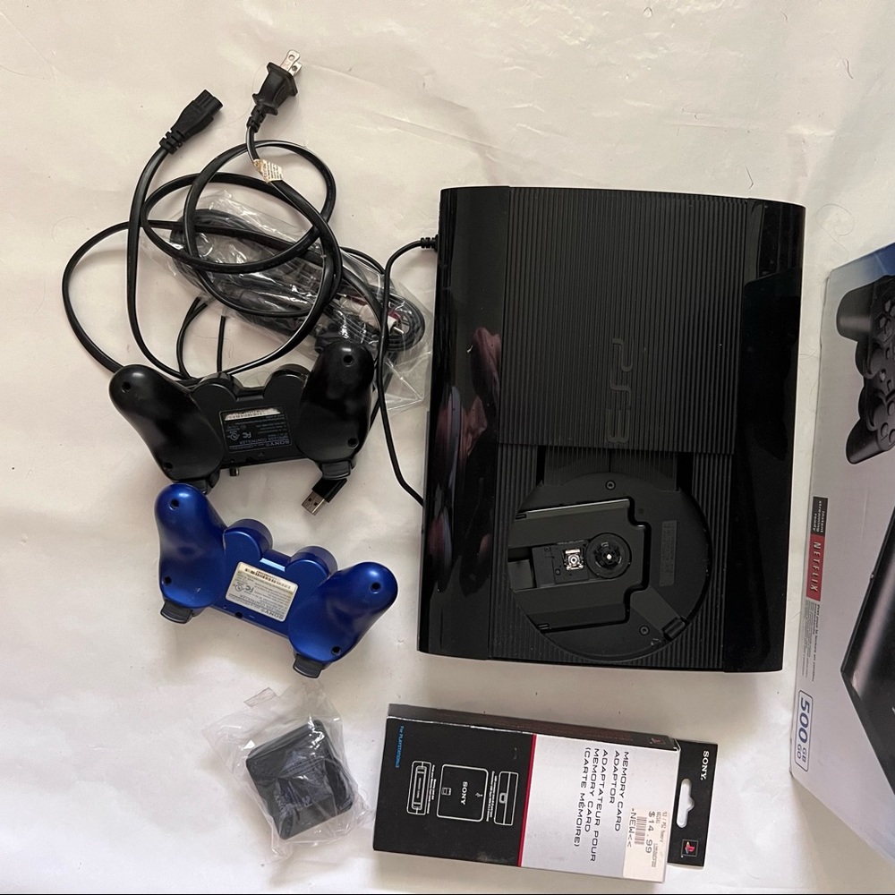 Bundle: Sony PS3 super slim with extras